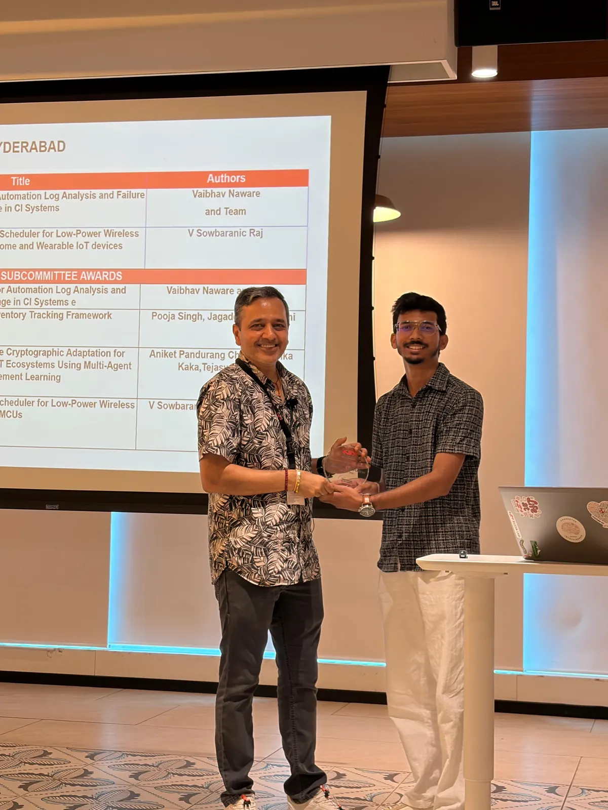 Receiving Silicon Labs Technical Symposium award on stage